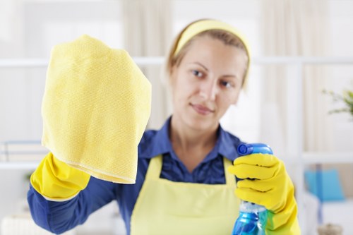 Team member applying safe working practices during a carpet cleaning job